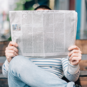 reading newspaper 170